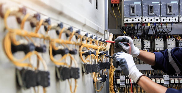 Professional Electrician technician working in Freedom, PA